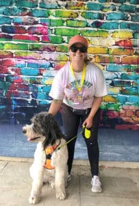 Photo of Candice Goodsell, Project Manager at Goldman Marketing Group, with her dog